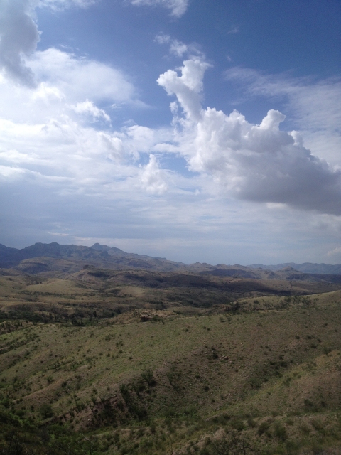 Aerial view of a land with mountains and the sky