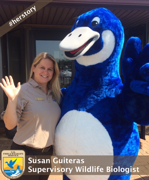 Susan stands side by side with the blue goose