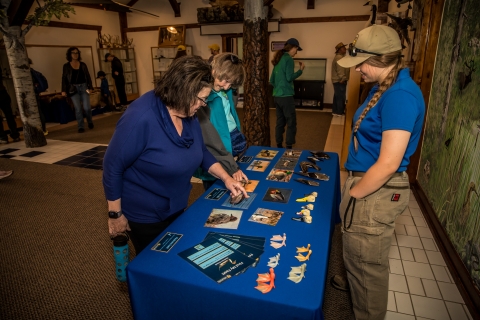 Seasonal park ranger Jaelyn Wesche facilitates a waterfowl identification education program
