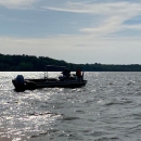 Silhouette of a boat on a lake