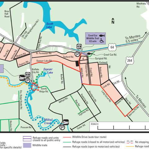 A complex map showing the refuge boundary, roads, and walking trails, colored in purple, green, and yellow to indicate access. For accessibility, please call 252-473-1131