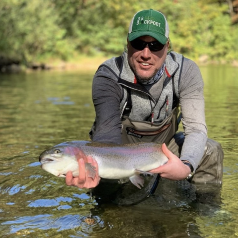 Matt Filsinger holding large trout.