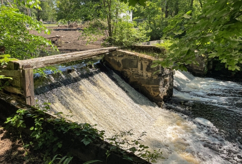The High Street Dam intact with water passing over