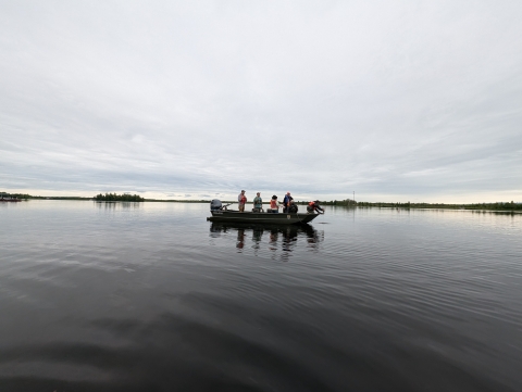 Boat with several people on it in Big Lake, Alaska.