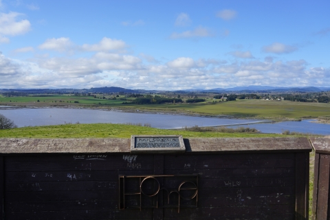 Observation platform in front of body of water