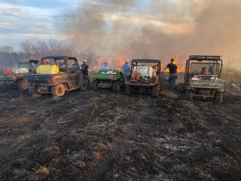 prescribed burn with trucks