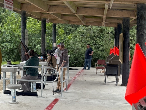 Target shooters wearing safety gear use the new Hank Harmon Public Range