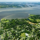 Aerial view of a river flowing past a town