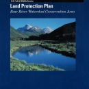 Book Cover with Land Protection Plan: Bear River Watershed Conservation Area written on it along with a picture of a river, a grassy river bank, and snowy mountains.