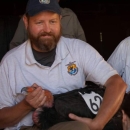 Douglass Cooper holds a California Condor. 