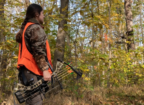 Female bow hunter